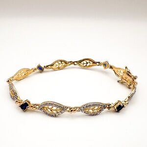 Tennis bracelet, blue gemstones, sterling silver 925 and gold vermeil signed 7”